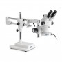 Kern Stereo Zoom OZM 923, Trinokular, 7-45x, HSWF 10x23 mm, Stativ mit Doppelarm, 430x480 mm, mit Tischplatte, LED-Ringlicht 4,5